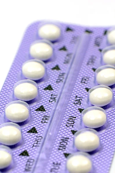 Contraceptive Pill with English Instructions closed-up on white background. — Stock Photo, Image