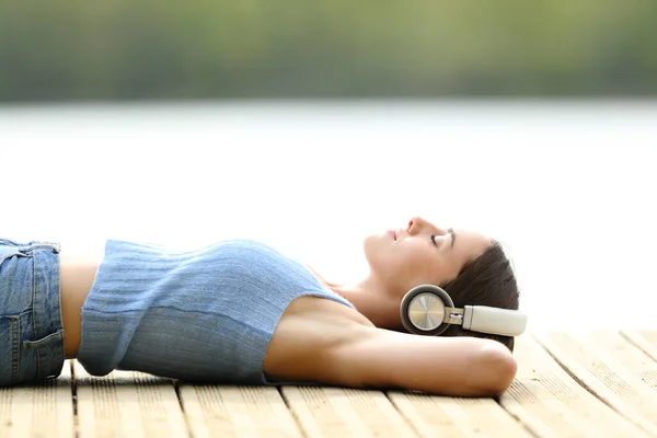 Side View Portrait Relaxed Woman Wearing Headphones Listening Music Lying — Stock Photo, Image