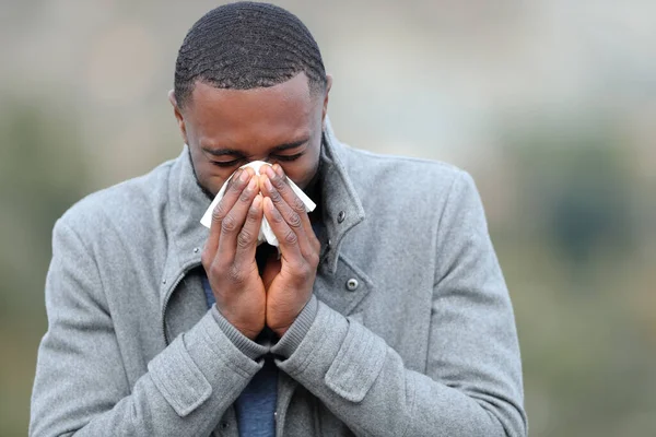 Ill Man Black Skin Blowing Tissue Outddors Winter — Stock Photo, Image