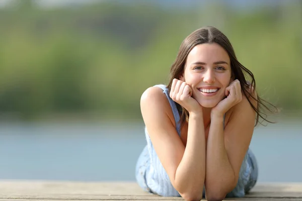 Happy Woman Looking Camera Lying Pier Copy Space — Stock Photo, Image