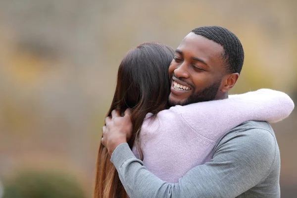 Couple Hugging Outdoors Happy Man Smiling Park — Stock Photo, Image