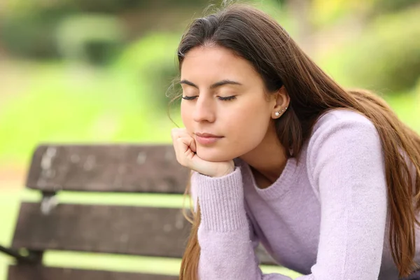 Relaxed Teen Resting Closed Eyes Sitting Bench Park — Stock Photo, Image