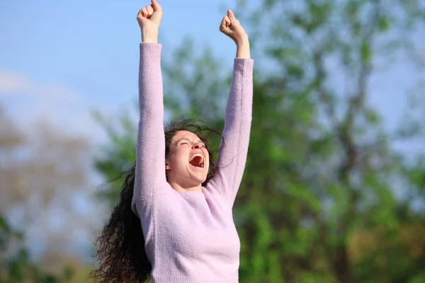 Excited Woman Raising Arms Park Celebrating Good Day Wearing Sweater — Foto de Stock