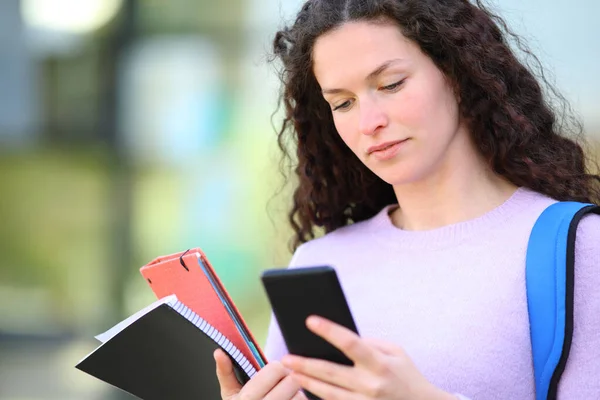 Serious Student Reading Smart Phone Content Walking Campus — Stock Photo, Image