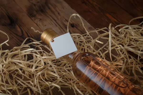 250 Bottle Pink Wine Blank Label Lying Wooden Shavings Wooden — Stock Photo, Image