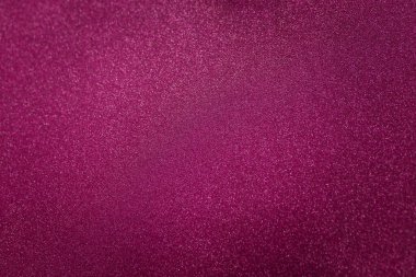 Parlak pembe ya da parlak parıltılı mor dekoratif kağıt. Doku arkaplanı, yumuşak odaklı çekim