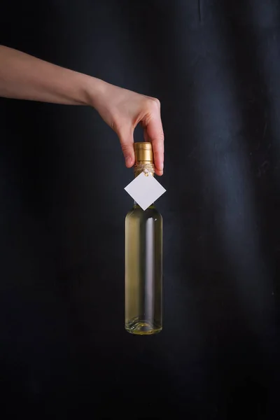 Female Hand Holding 250 Bottle White Wine Mock Label Brand — стоковое фото