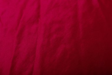 Kırmızı pamuk kumaş dokusu, arkaplan ya da fon. Kıyafet, dikiş, kongre yapımı, tuhafiye. Boşluğu kopyala.