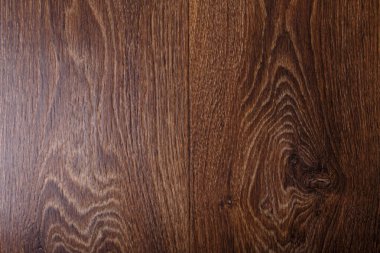 Kahverengi döşeme, ahşap desenli yüzey, arka plan dokusu. Yer değiştirme, iç tasarım.