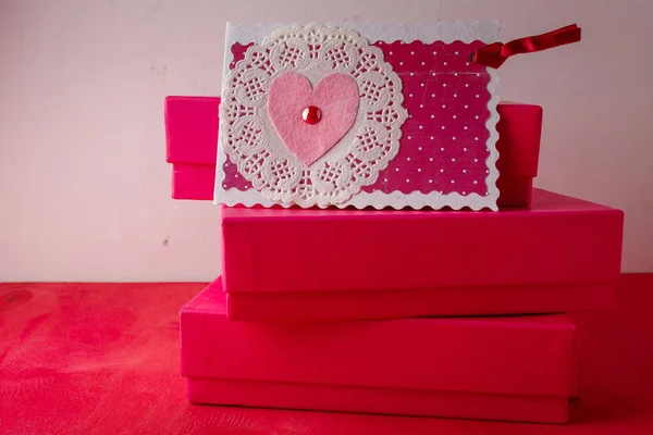 Three Bright Pink Present Boxes Postcard Heart Painted Wooden Background — ストック写真