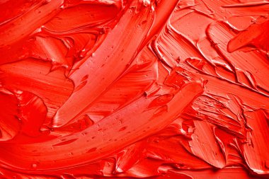 Kırmızı boya dokusu. Kırmızı ruj arkaplanı. Üst görünüm