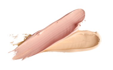 Makyaj vakfı, bej krem lekesi beyaz arkaplanda izole.