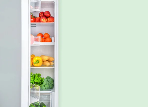 Open Fridge Full Vegetables Fruits Green Wall Background — Stock Photo, Image