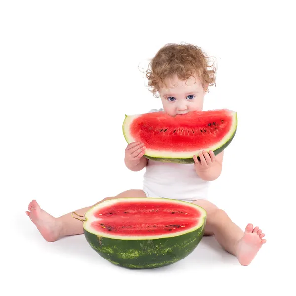 Cute baby eating a watermelon — Stock Photo, Image