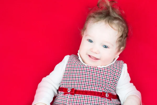 Little girl in a red dress — Stock Photo, Image