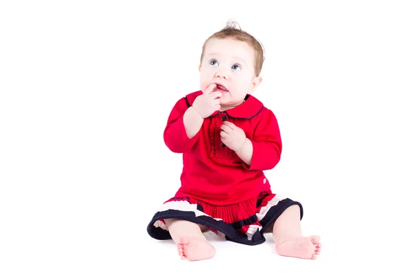 Bébé fille dans une robe rouge — Photo