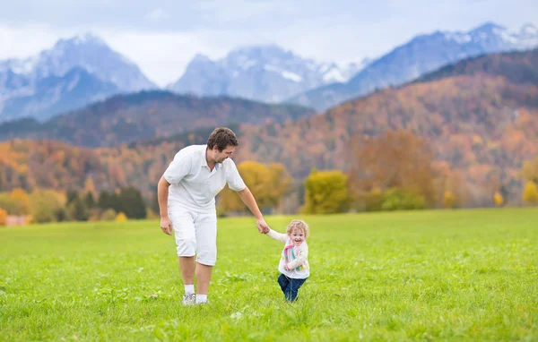 Happy father playing with his baby daughter — Stock Photo, Image