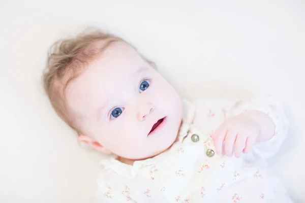 Baby girl wearing an elegant lace shirt — Stock Photo, Image