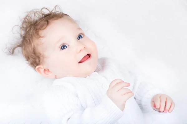 Baby on a white blanket — Stock Photo, Image