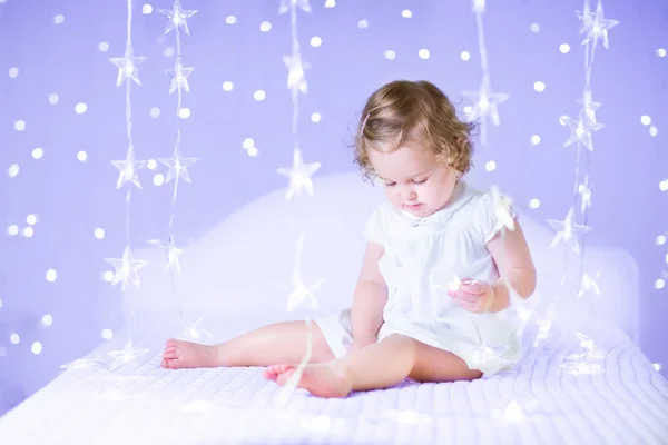 Baby girl playing with Christmas — Stock Photo, Image
