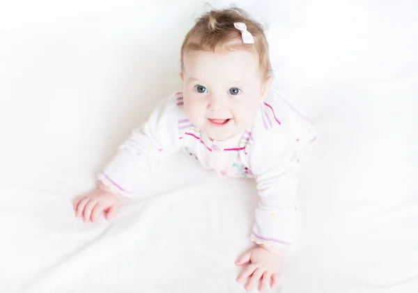 Baby girl starting to crawl — Stock Photo, Image