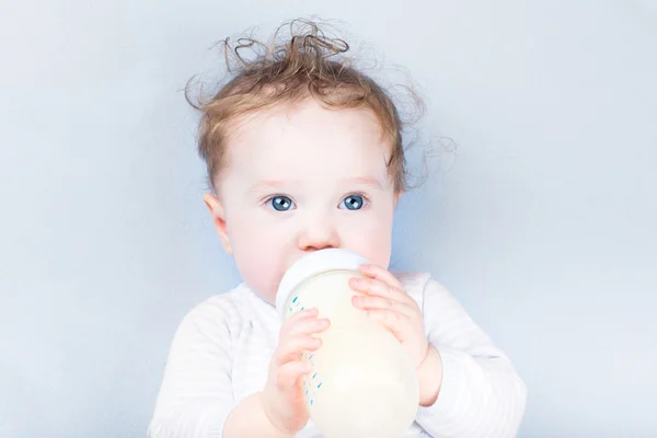 Cute baby drinking milk — Stock Photo, Image