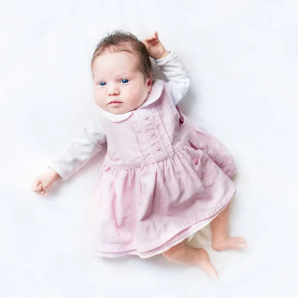 Baby girl wearing her first dress — Stock Photo, Image