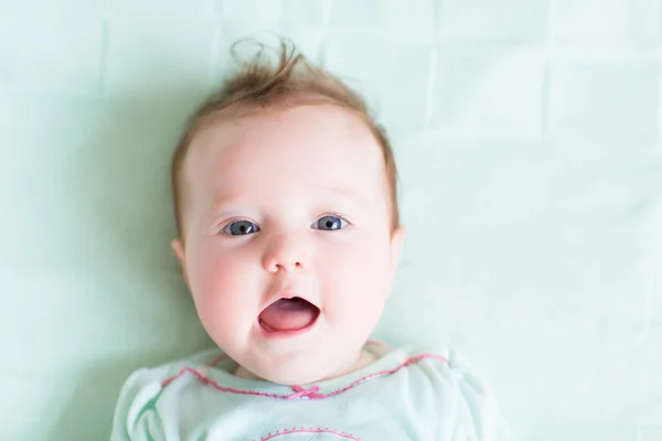 Aby girl in a green shirt — Stock Photo, Image