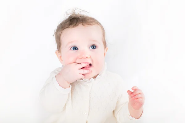 Baby girl sucking on her finger — Stock Photo, Image