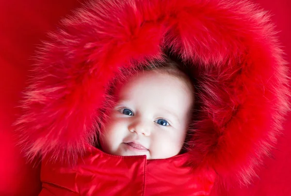 Funny baby girl with beautiful blue eyes — Stock Photo, Image