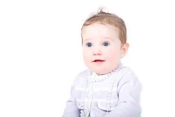 Baby girl with a pearl necklace — Stock Photo, Image