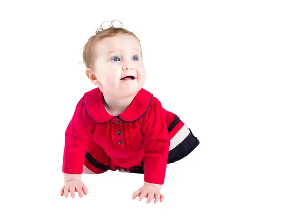 Sweet little baby girl in a red dress — Stock Photo, Image