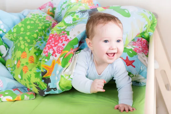 Baby playing peek-a-boo — Stock Photo, Image