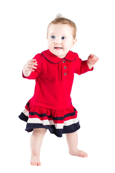 Słodkie dziecko dziewczynka w czerwonej sukience — Zdjęcie stockowe
