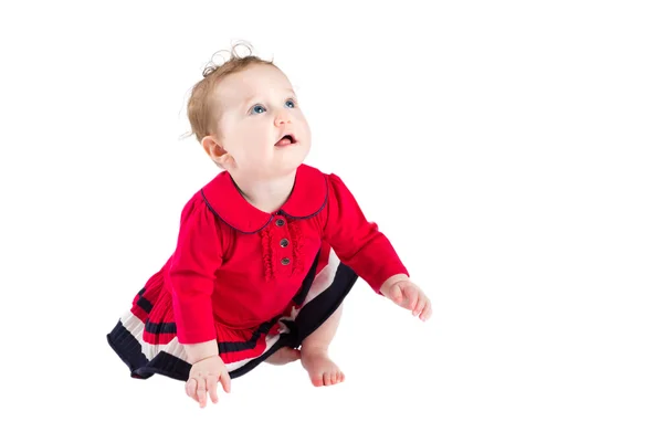 Doce menina em um vestido vermelho — Fotografia de Stock