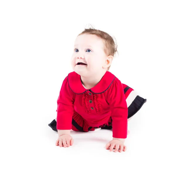Baby flicka i en röd klänning — Stockfoto