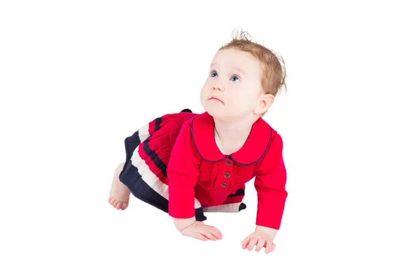 Bebé niña en un vestido rojo aprendiendo a gatear —  Fotos de Stock