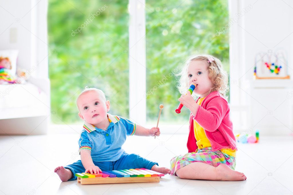 Kids playing music with xylophone Stock Photo by ©FamVeldman 49279297 Kids playing music with xylophone Stock Photo by ©FamVeldman 49279297