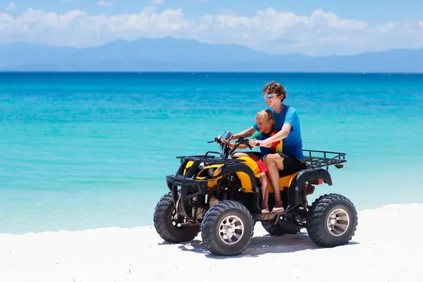 Teenager His Little Brother Riding Quad Bike Tropical Beach Active — Stock Photo, Image