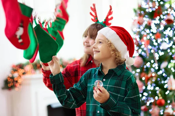 Kids Opening Christmas Presents Child Searching Candy Gifts Stocking Advent — Stock Photo, Image
