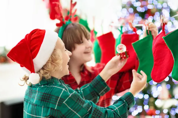 Kids Opening Christmas Presents Child Searching Candy Gifts Stocking Advent — Stock Photo, Image