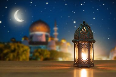 Ramadan Kareem greeting. Islamic lantern on night sky with crescent moon and stars. End of fasting. Hari Raya card. Eid al-Fitr decoration. Breaking of holy fast day. Muslim holiday. clipart