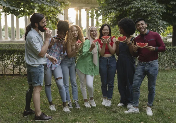 Close Portrait Cheerful Multiracial Friends Holding Pieces Watermelon Smiling Camera — Fotografia de Stock
