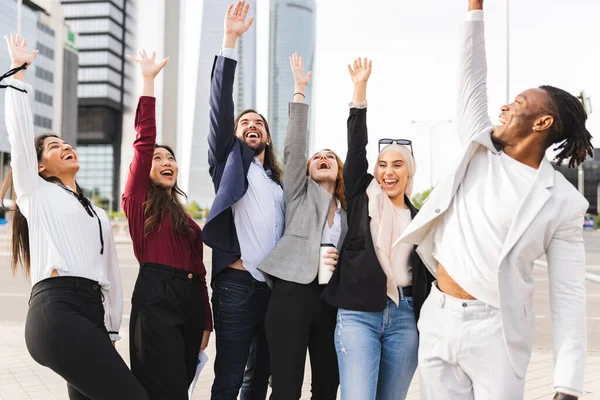 Multiracial Coworkers Raise Hands Celebrating Trade Agreement Business — Fotografia de Stock