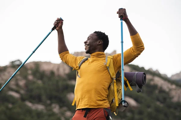 African American Man Trekking Mountaineer Arrives His Destination Adventurer Traveler — стокове фото