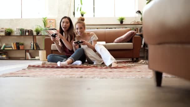 Two Female Friends Home Playing Console Lgbt Concept Multiracial — Stockvideo