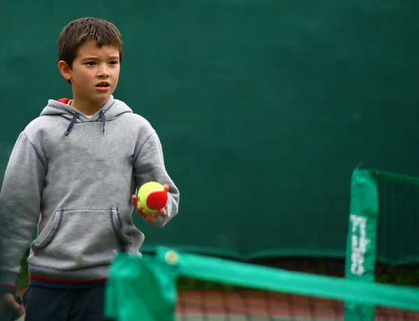 Pequeno tenista grande jogador — Fotografia de Stock