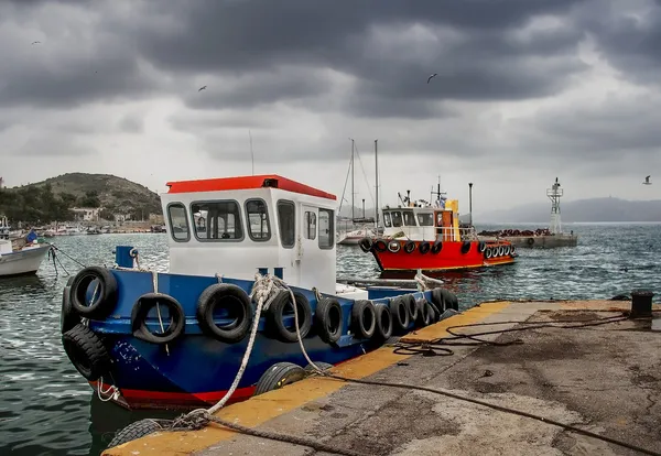 Fishing boats in a rainy day — Stock Photo, Image