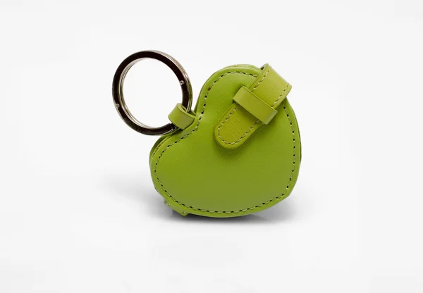 Green leather trinket isolated on white — Stock Photo, Image