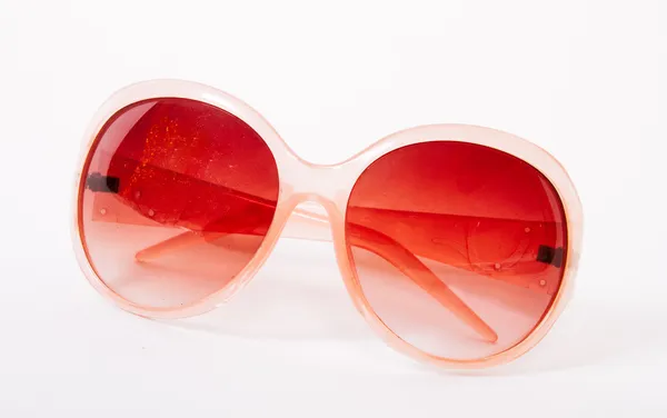 Through rose-colored glasses the world looks much more optimistic. — Stock Photo, Image